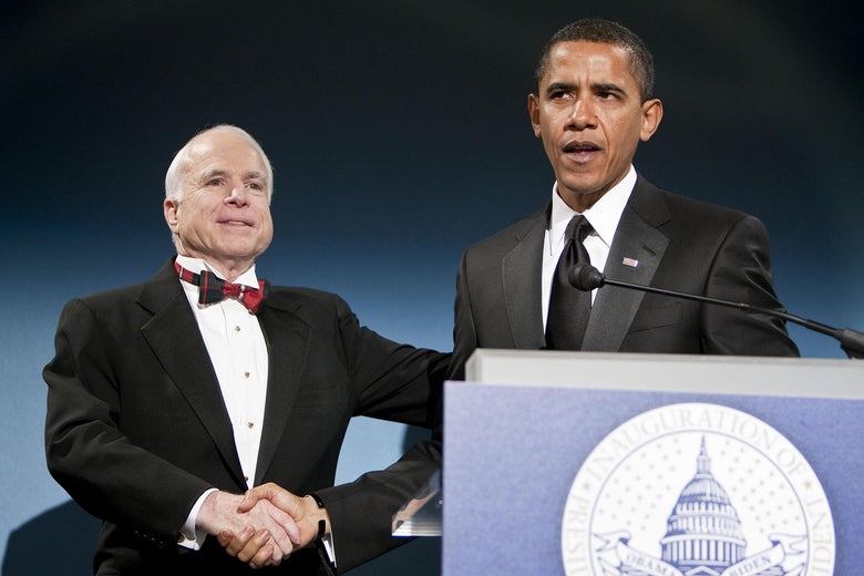 John McCain and Barack Obama share a handshake
